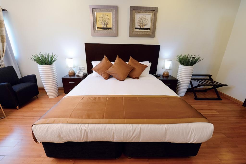 Timor Plaza Hotel & Apartments Dili Rum bild