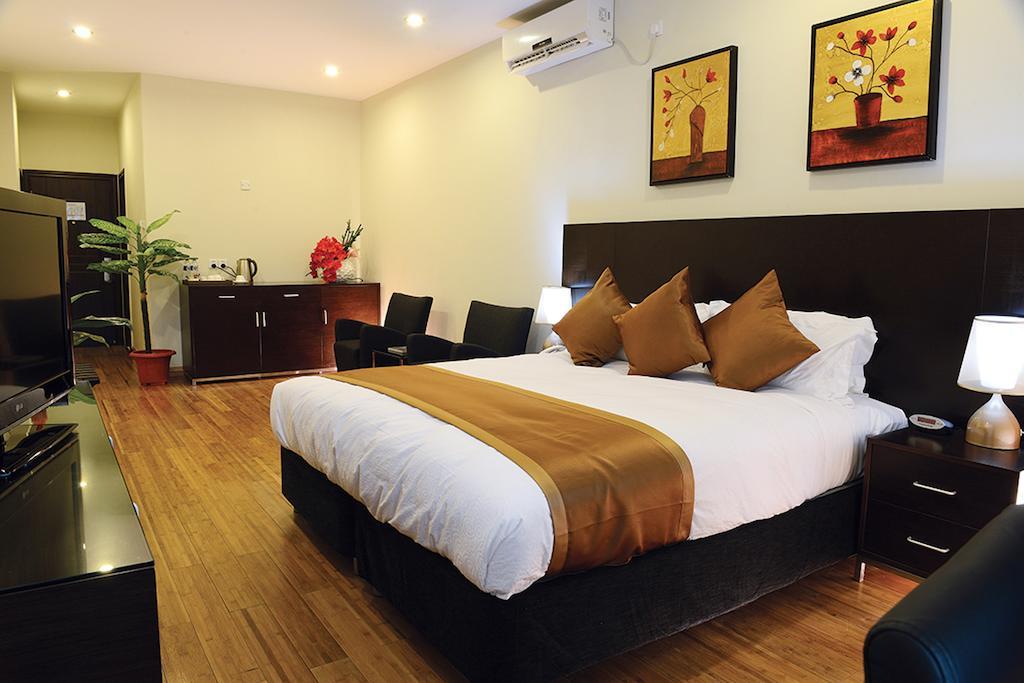 Timor Plaza Hotel & Apartments Dili Rum bild