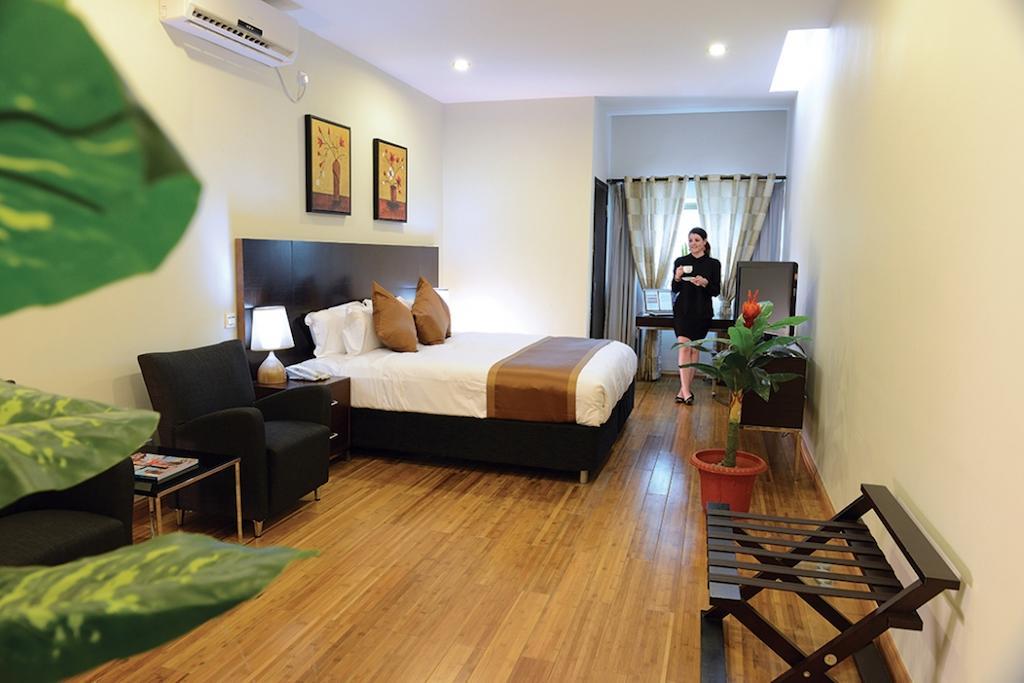 Timor Plaza Hotel & Apartments Dili Rum bild